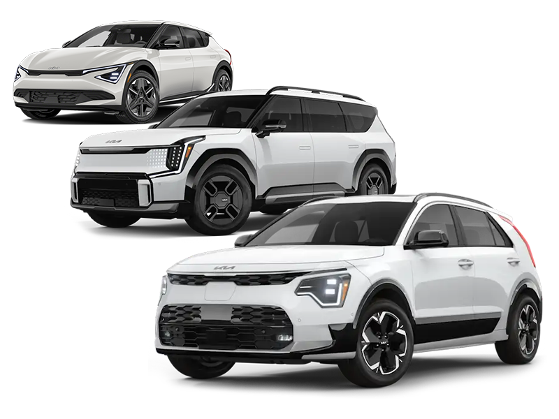 Three white Kia electric vehicles—Niro, EV9, and EV6—stacked in a dynamic layout with the Niro in front, the EV9 in the middle, and the EV6 in the background. All vehicles are angled slightly to the right.