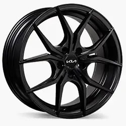 Black 10-spoke Kia alloy wheel with a sleek, matte finish and Kia logo at the centre.